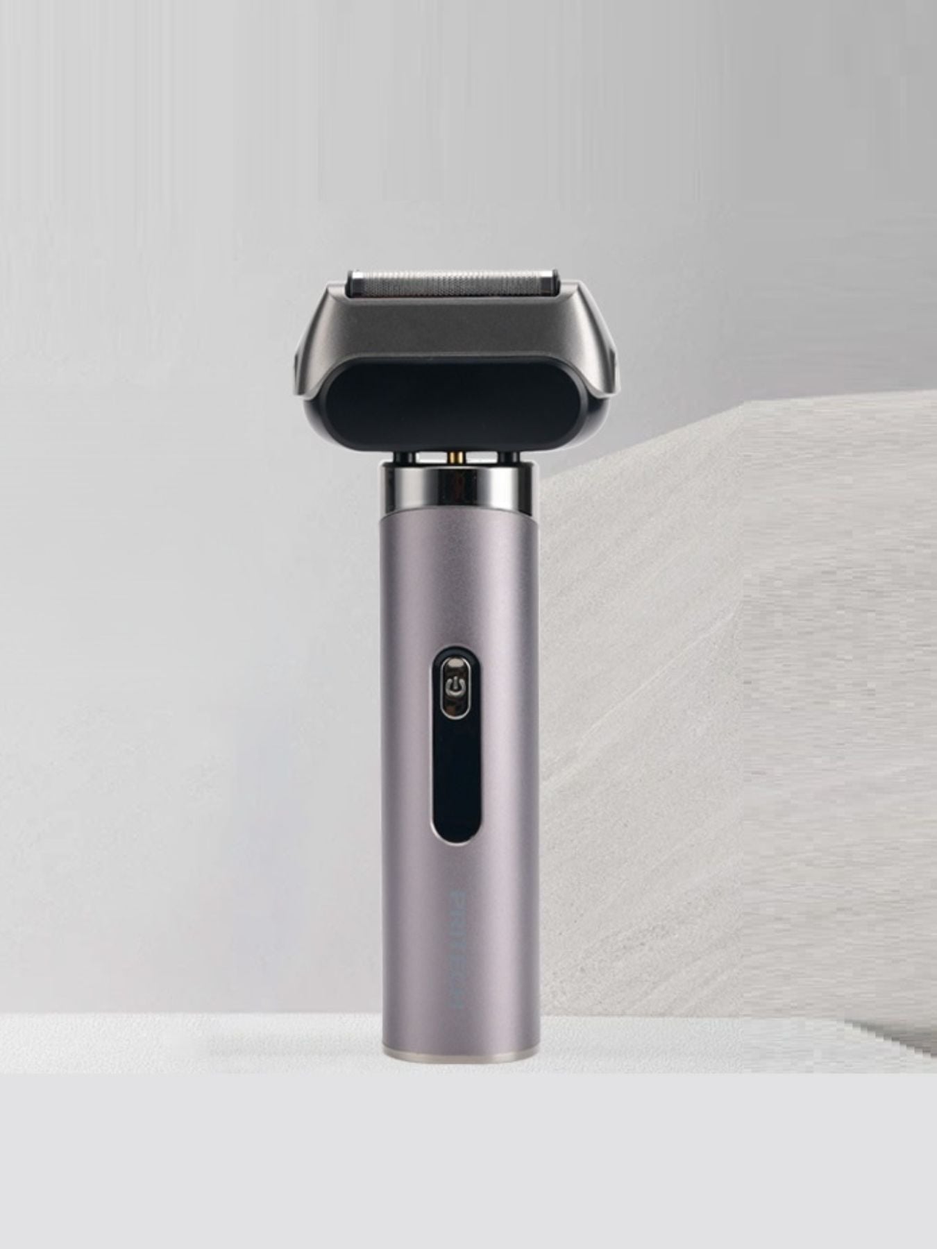 Gray portable foil shaver from Trendsi with a compact design, ideal for travel grooming and quick touch-ups.