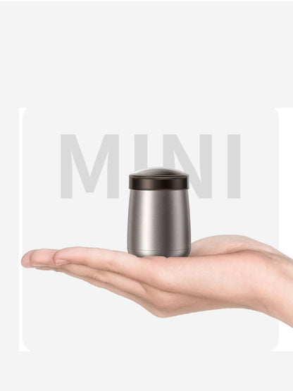 Gray portable mini electric shaver by Trendsi, compact design with a sleek finish, ideal for quick grooming on the go.