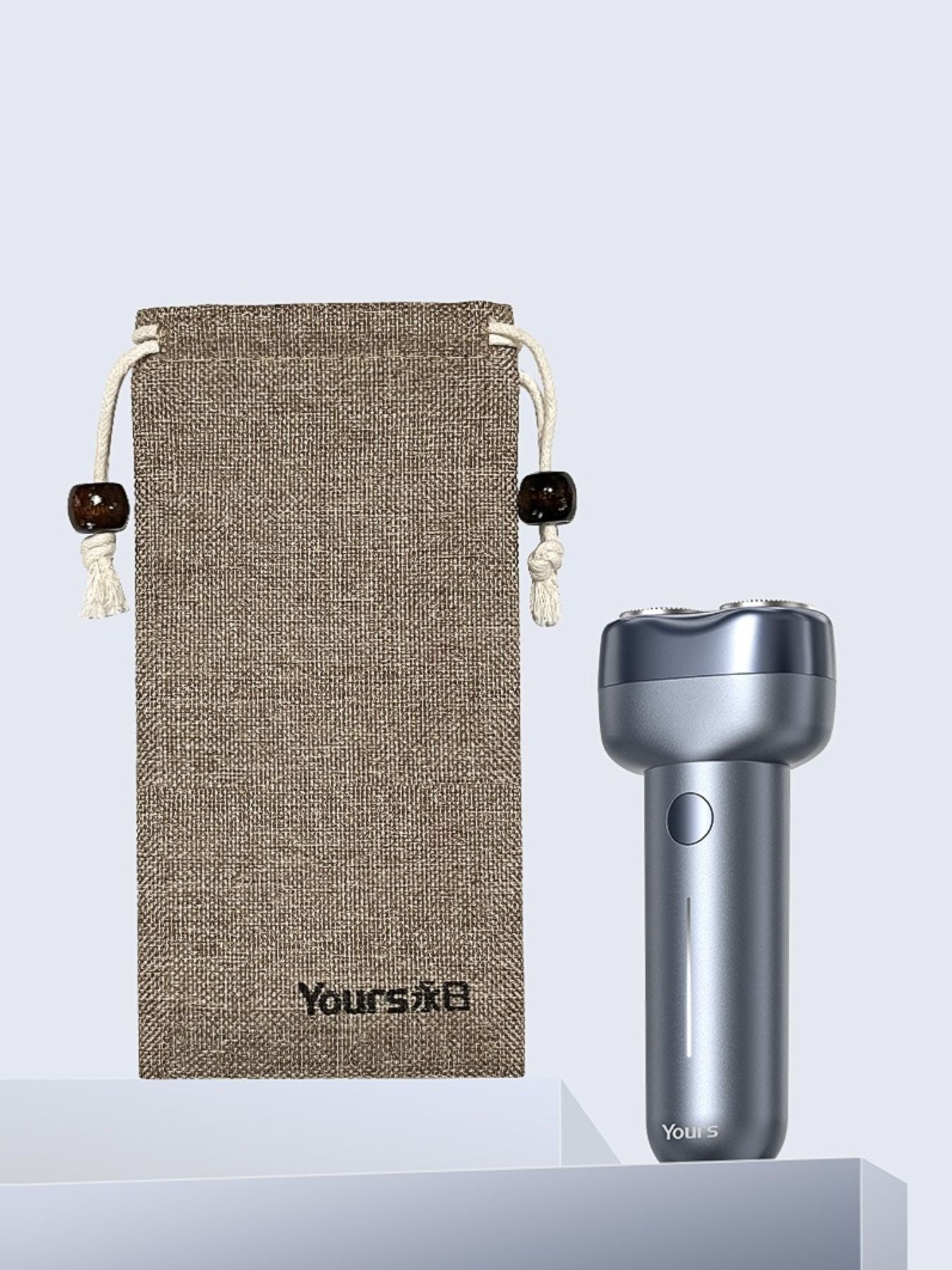 Gray waterproof electric shaver by Trendsi with a sleek design, suitable for wet and dry shaving.
