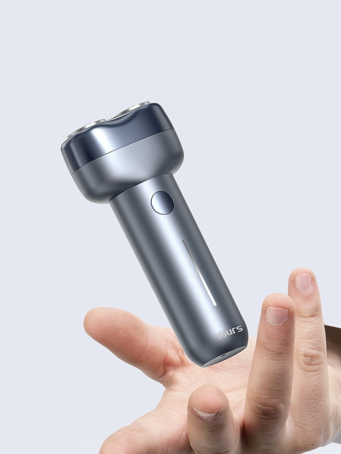 Gray waterproof electric shaver by Trendsi with a sleek design, suitable for wet and dry use, shown in a close-up view.
