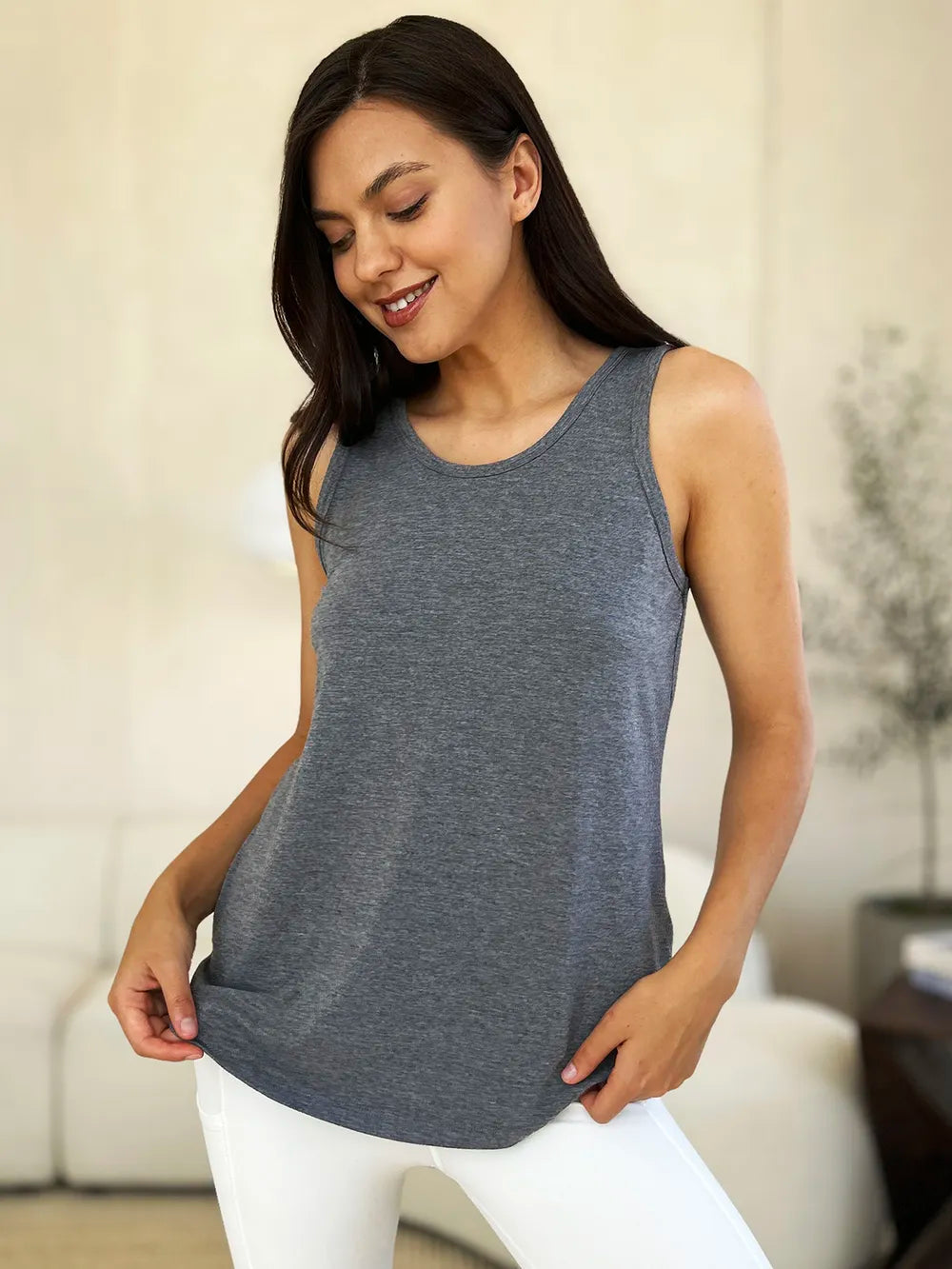 Gray Basic Bae full-size tank top by Trendsi with a round neckline and curved hem, displayed on a plain background.