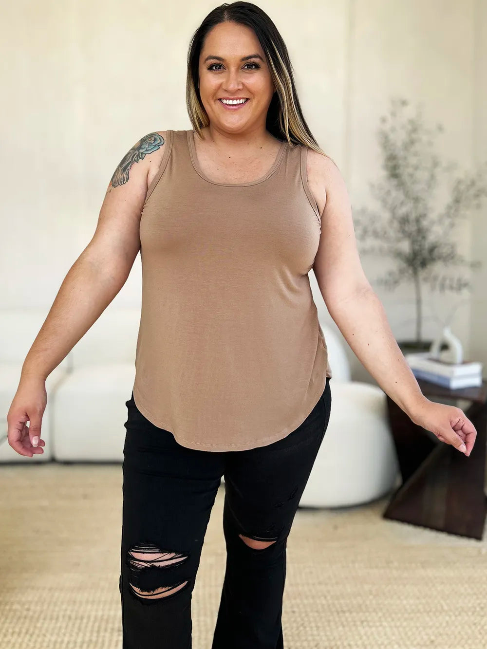 Gray Basic Bae full-size round neck curved hem tank top by Trendsi, featuring a relaxed fit and stylish curved hem design.