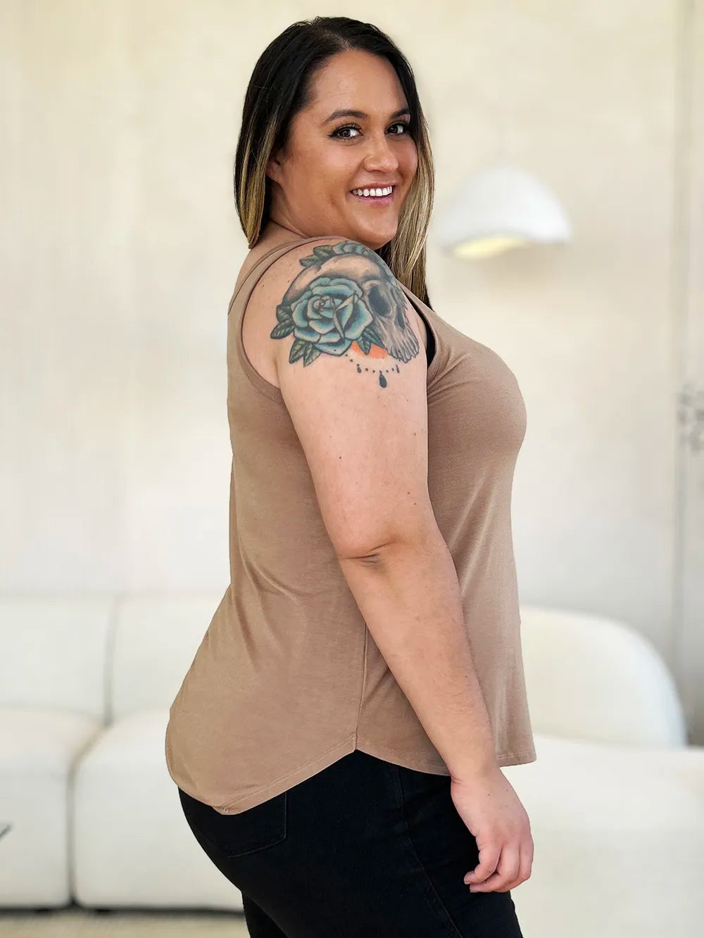 Gray Basic Bae full-size round neck curved hem tank top by Trendsi, shown flat with a relaxed fit and curved hem detail.