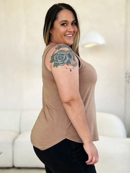 Gray Basic Bae full-size round neck curved hem tank top by Trendsi, shown flat with a relaxed fit and curved hem detail.