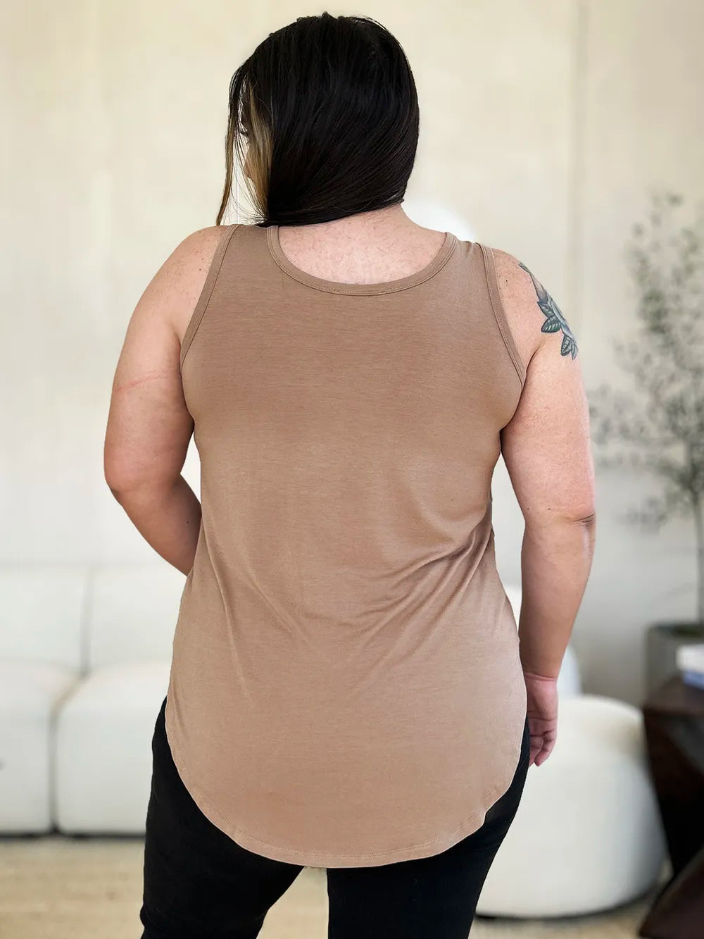 Gray Basic Bae full-size round neck curved hem tank top by Trendsi, shown flat with curved hem detail and sleeveless design.