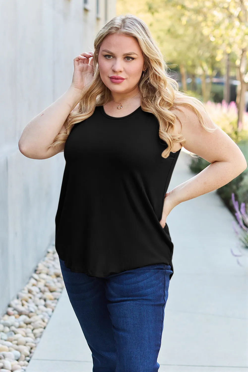 Gray Basic Bae full-size round neck curved hem tank top from Trendsi, casual sleeveless shirt with relaxed fit