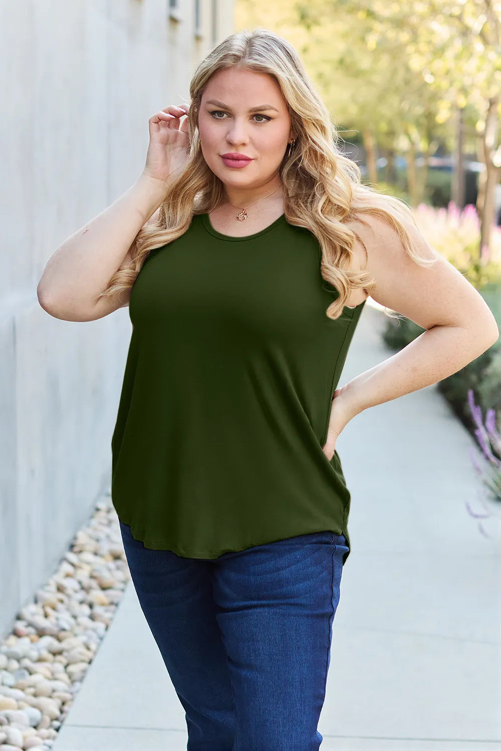 Gray basic Bae full-size round neck curved hem tank top by Trendsi, shown on a model with a casual fit.