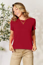 Gray Basic Bae full size round neck short sleeve T-shirt by Trendsi, casual cotton tee with a classic fit and short sleeves.