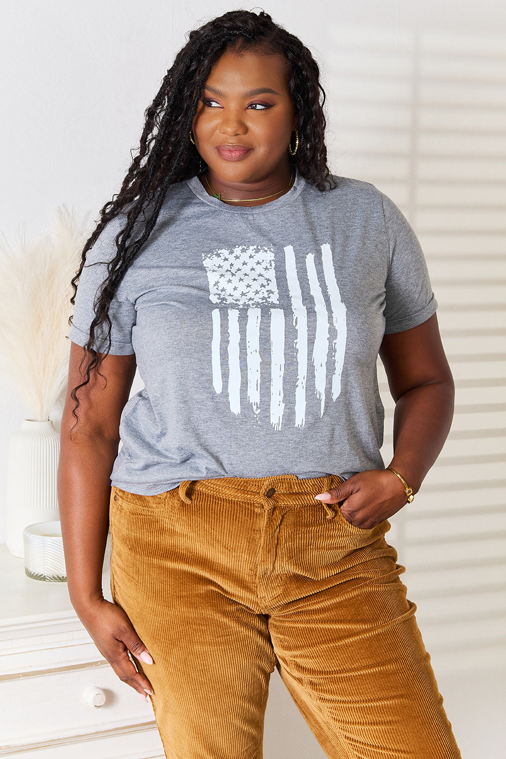 Gray Simply Love US Flag graphic cuffed sleeve T-shirt by Trendsi featuring a patriotic US flag design on the front.
