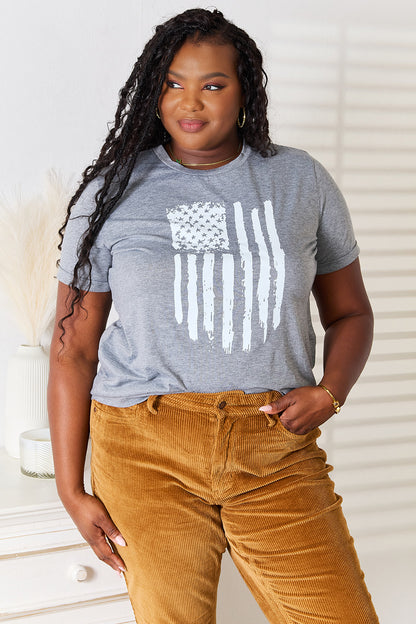 Gray Simply Love US Flag graphic cuffed sleeve T-shirt by Trendsi featuring a patriotic US flag design on the front.
