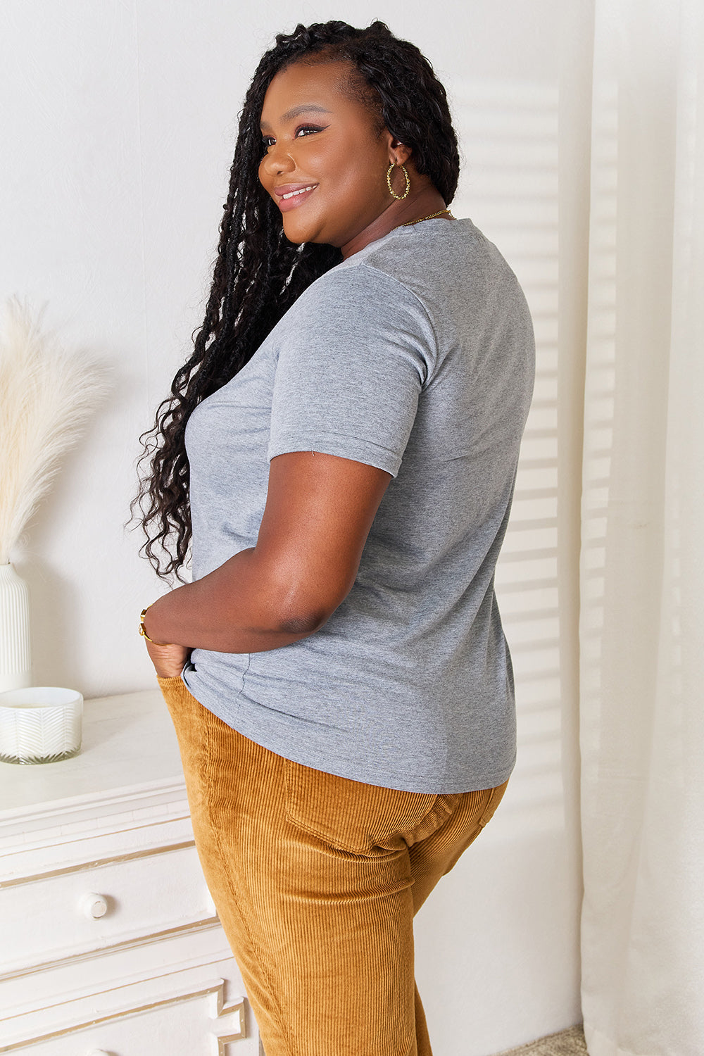 Gray Simply Love US Flag graphic cuffed sleeve T-shirt by Trendsi featuring patriotic flag design on soft cotton fabric.