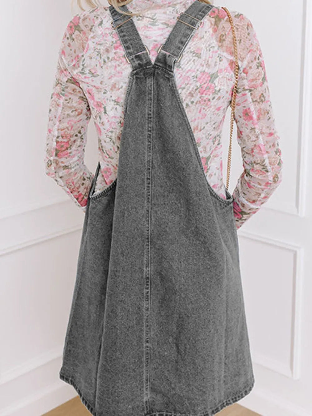 Gray wide strap button-down denim overall dress by Trendsi, featuring adjustable straps and front pockets, casual and stylish.
