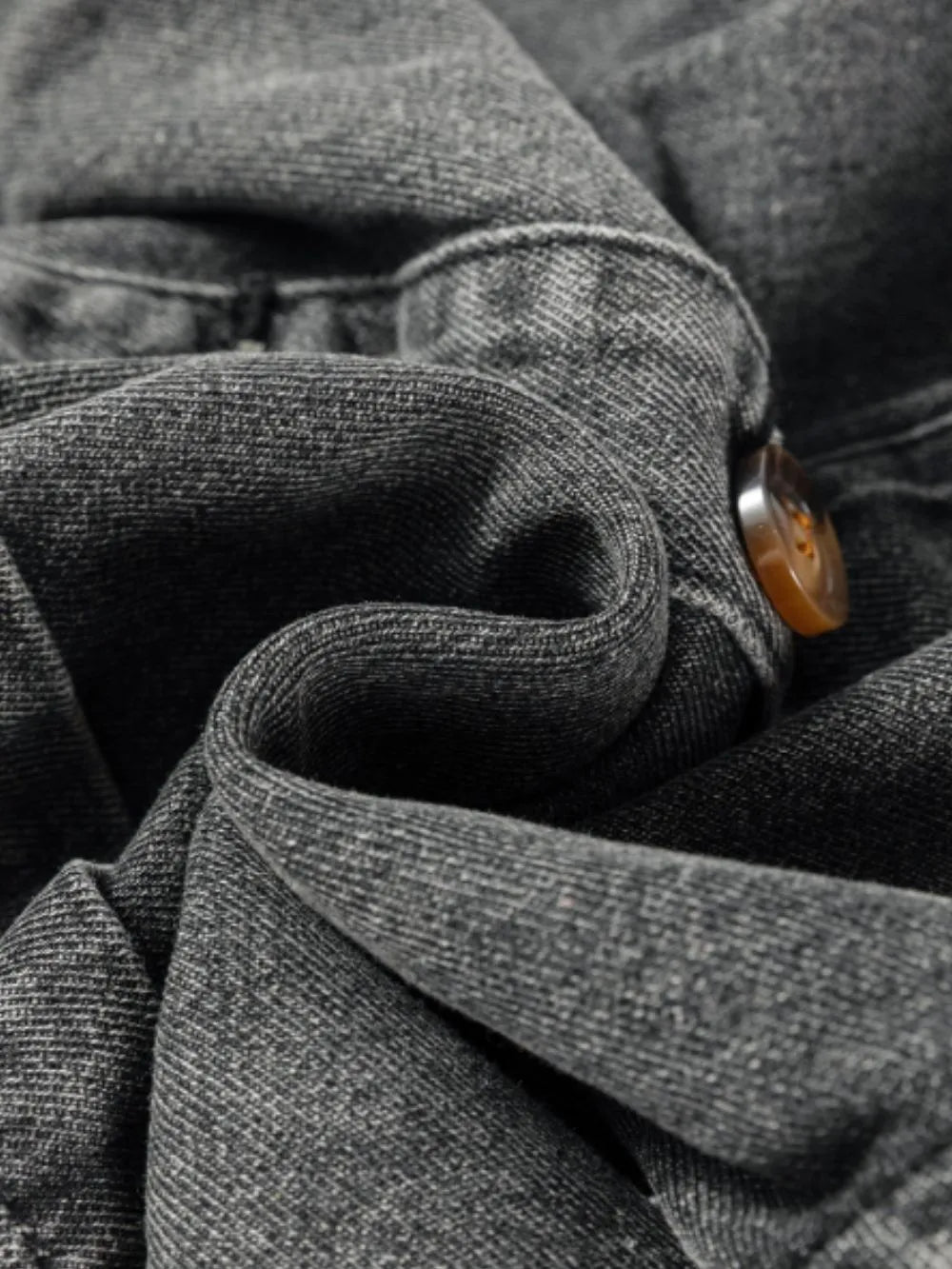 Gray wide strap button-down denim overall dress by Trendsi, featuring adjustable straps and classic denim fabric.