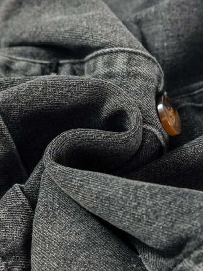 Gray wide strap button-down denim overall dress by Trendsi, featuring adjustable straps and classic denim fabric.