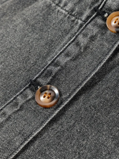 Gray wide strap button-down denim overall dress by Trendsi, featuring adjustable straps and front button closure.