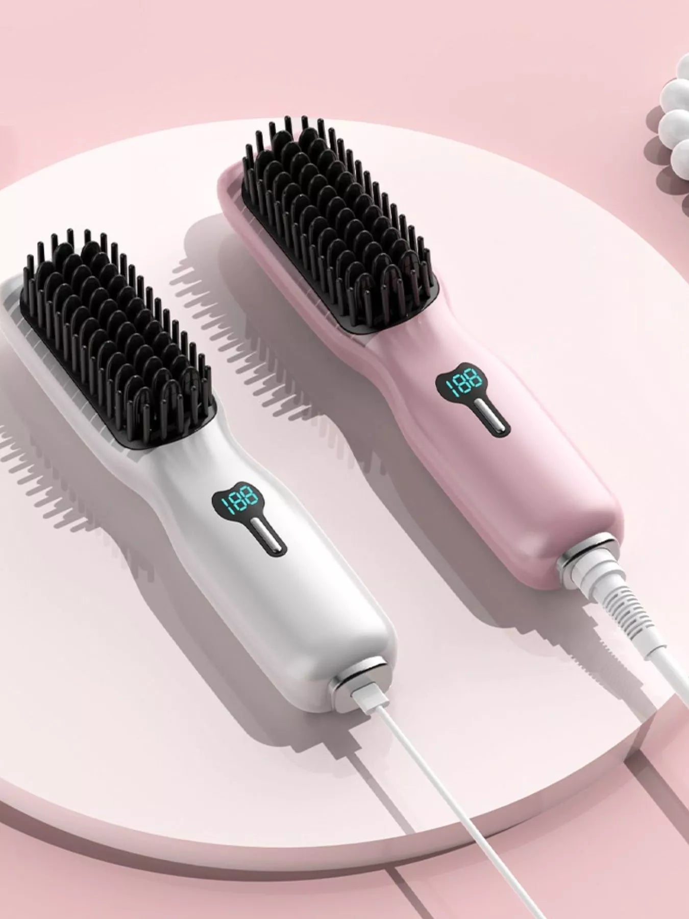 Gray and white heated straightening comb by Trendsi with ergonomic handle and ceramic plates for smooth, straight hair styling.