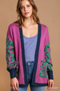 Green animal print open front sweater cardigan by Umgee featuring a cozy knit and stylish design.