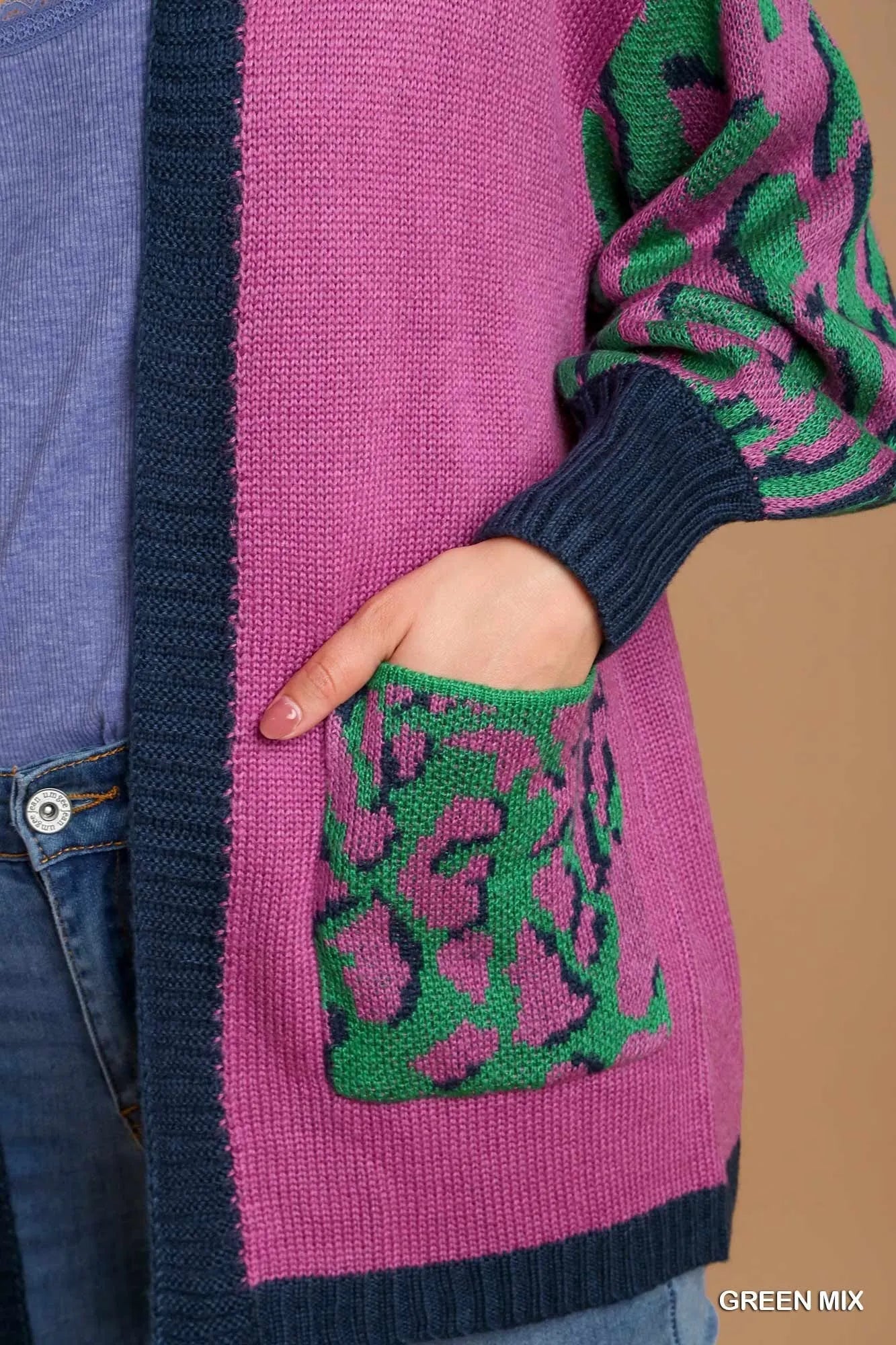 Green animal print open front sweater cardigan by Umgee featuring a cozy, stylish design with a relaxed fit.