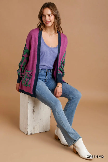 Green animal print open front sweater cardigan by Umgee, casual knit with long sleeves and cozy fit.