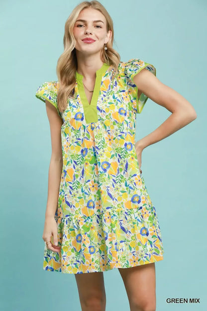 Green floral flutter sleeve tiered mini dress by Umgee, featuring a feminine design and lightweight fabric.