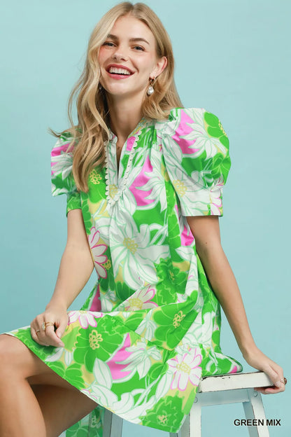 Green floral puff sleeve tiered mini dress by Umgee, featuring a feminine fit and ruffled sleeves, perfect for spring and summer wear.