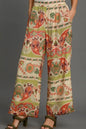 Plus size green mix wide-leg border print pants by Umgee, full size, relaxed fit, stylish and comfortable for casual wear.