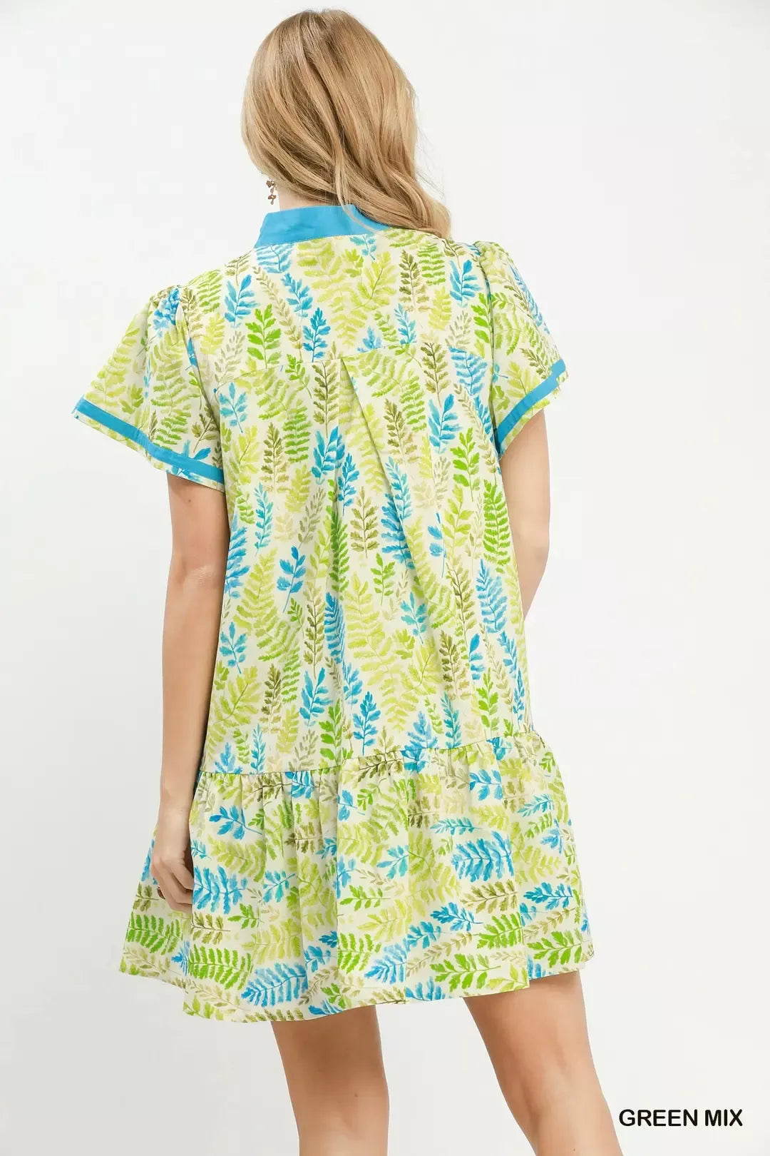 Green leaf print Umgee flutter sleeve tiered mini dress with a relaxed fit and stylish tiered design, perfect for casual wear.