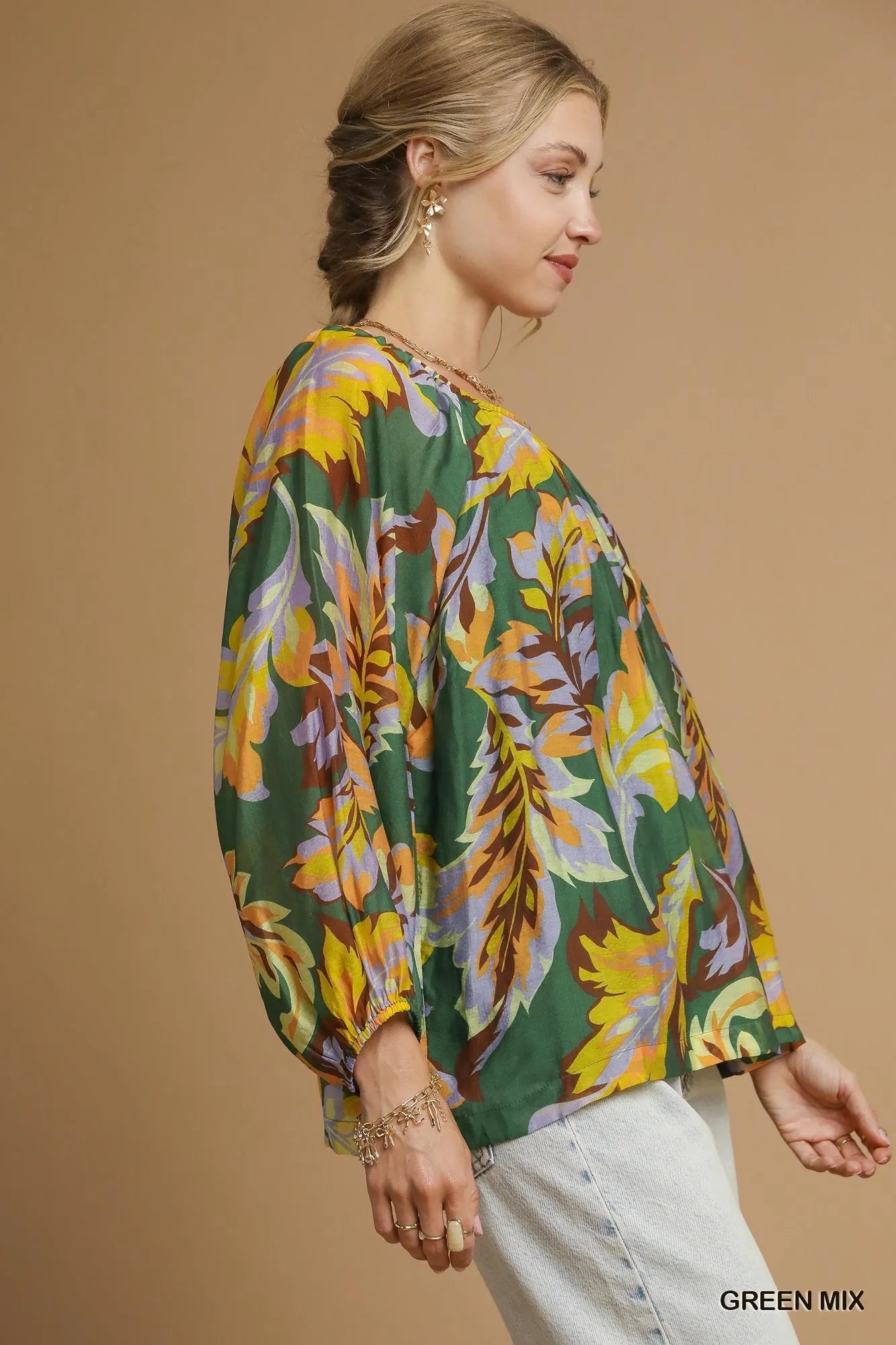 Green abstract print balloon sleeve blouse by Umgee, featuring stylish balloon sleeves and a trendy mixed print design.