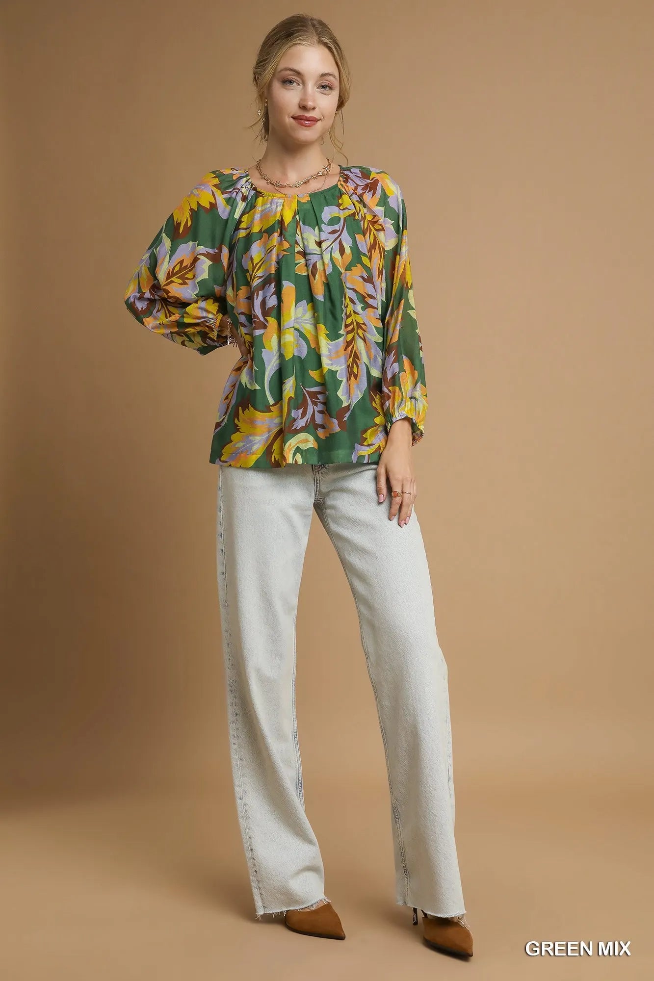 Green Umgee abstract print balloon sleeve blouse with relaxed fit and stylish design, perfect for casual or chic outfits.