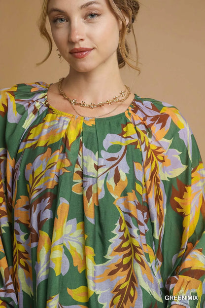 Green Umgee mix abstract print balloon sleeve blouse with a relaxed fit and stylish design, perfect for casual or chic outfits.