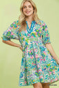 Green Umgee Mix botanical print puff sleeve tiered dress with ruffled details, perfect for casual or semi-formal occasions.