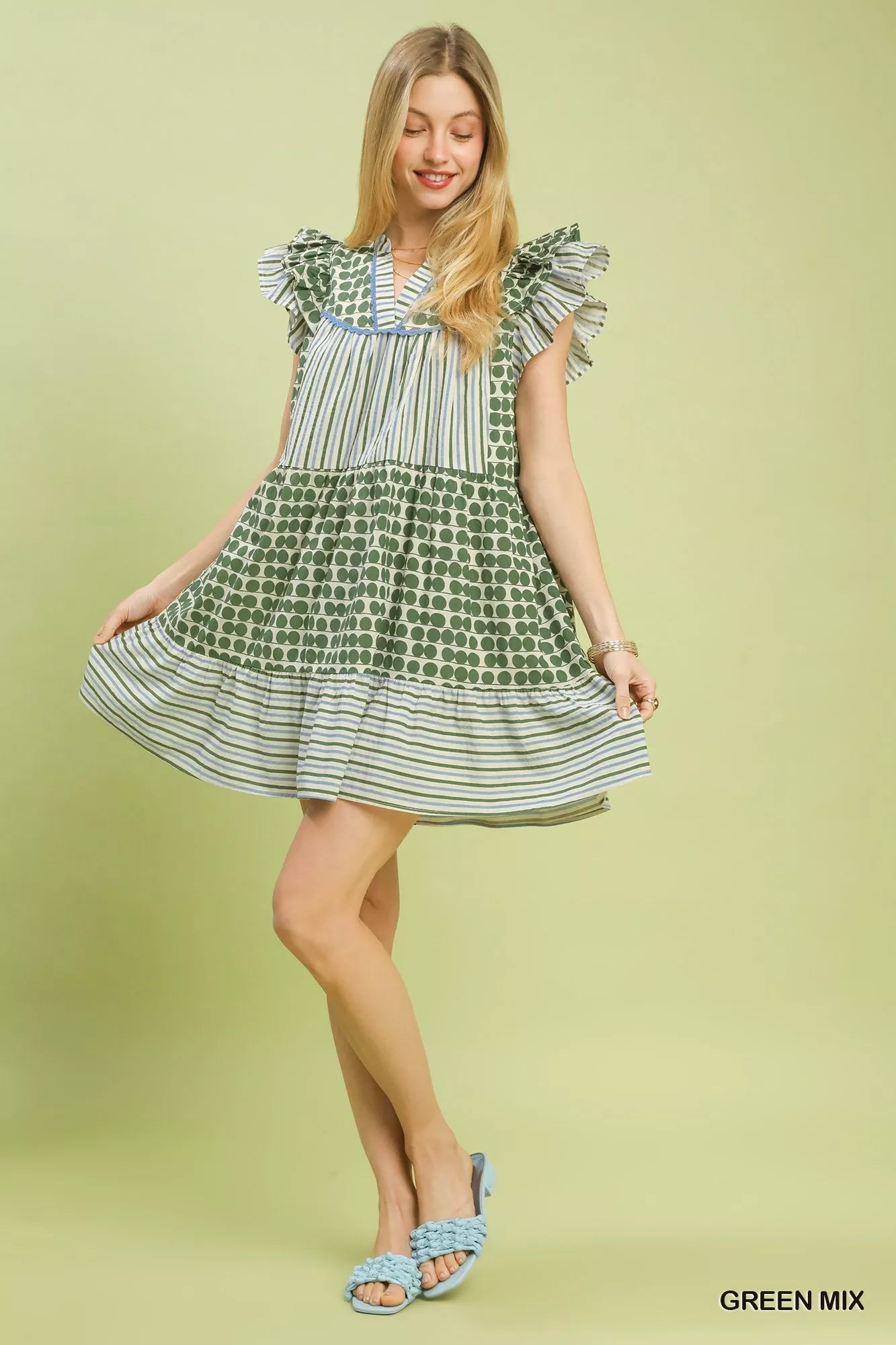 Green Umgee Mix Patchwork Flutter Sleeve Tiered Dress with boho style and layered fabric, perfect for casual or summer wear.