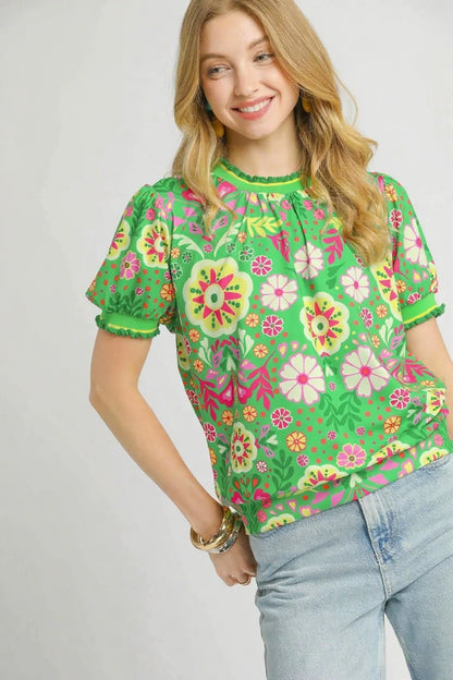 Green mix retro floral puff sleeve top by Umgee, featuring a vintage-inspired design and feminine puffed sleeves.