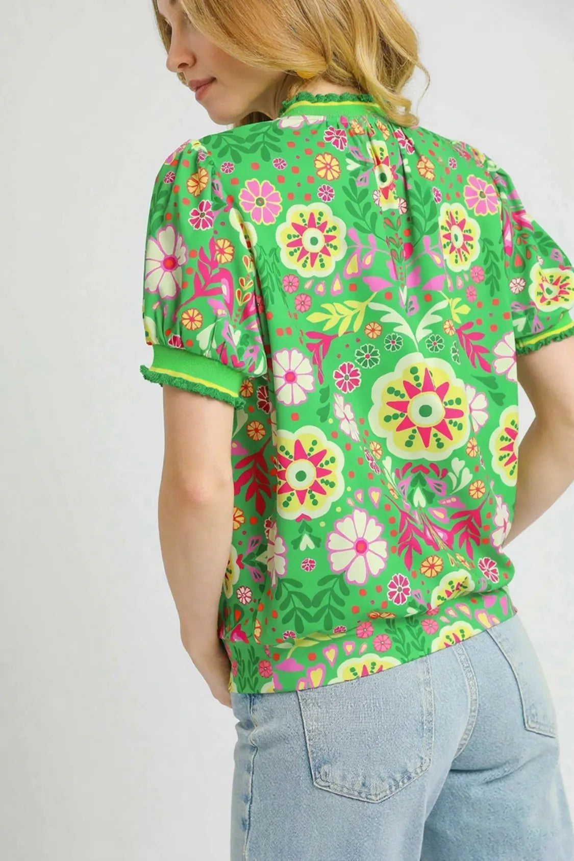 Green floral puff sleeve top by Umgee featuring vintage-inspired retro style and ruffled sleeves, casual and trendy for women.