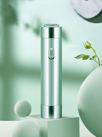 Green portable electric hair removal epilator by Trendsi, compact design with multiple attachments for efficient hair removal.