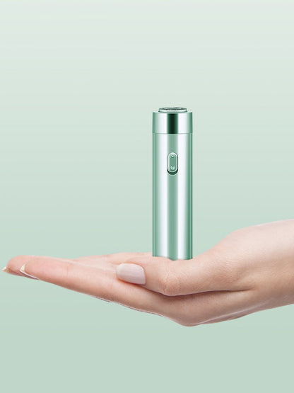 Green portable electric hair removal epilator by Trendsi with a compact design for easy use at home.
