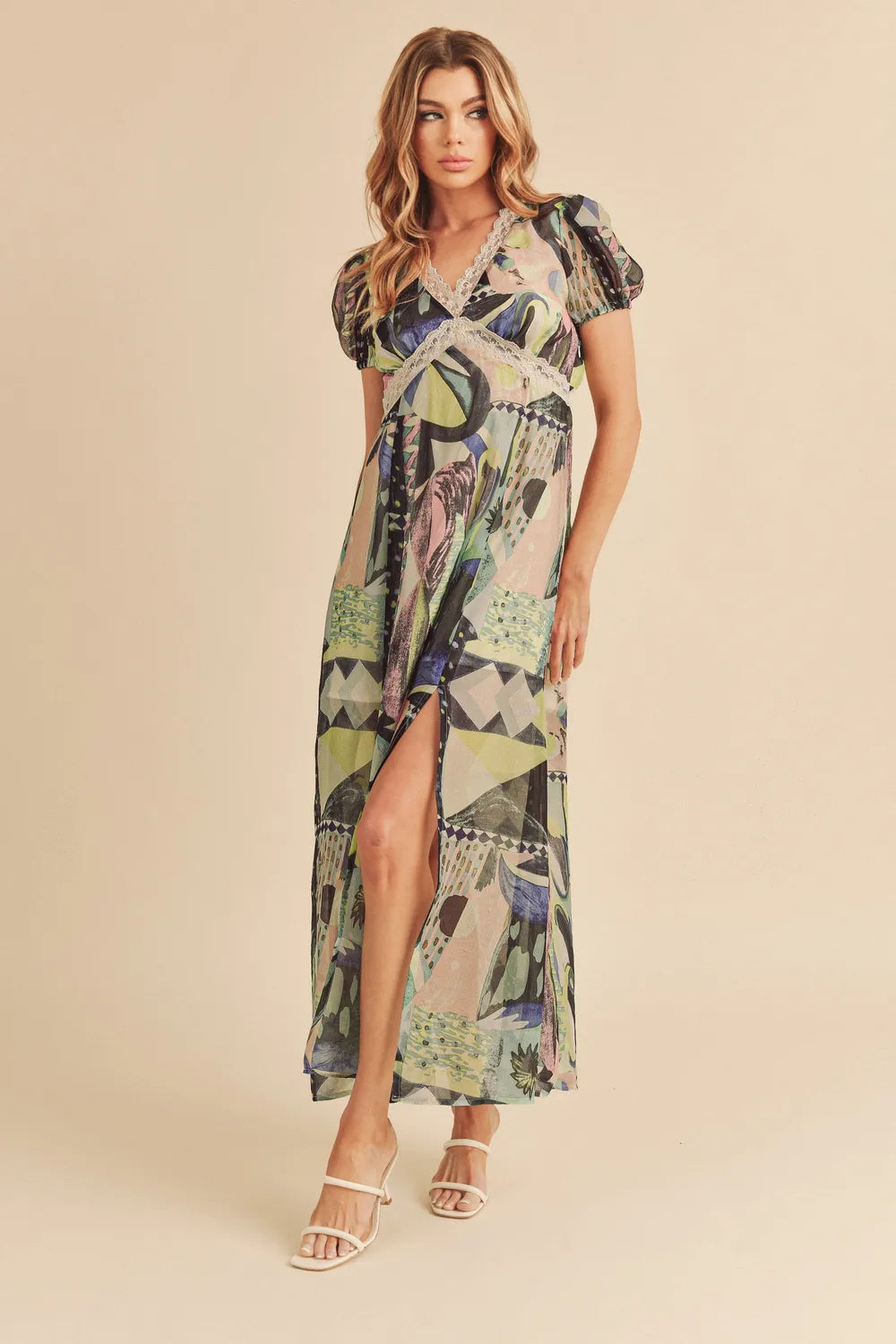 Green Aemi + Co lace detail slit geometric print short sleeve maxi dress with flowing silhouette and stylish design.