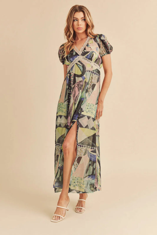 Green Aemi + Co lace detail slit geometric print short sleeve maxi dress with flowing silhouette and stylish design.