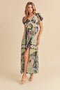 Green Aemi + Co lace detail slit geometric print short sleeve maxi dress with flowing silhouette and stylish design.