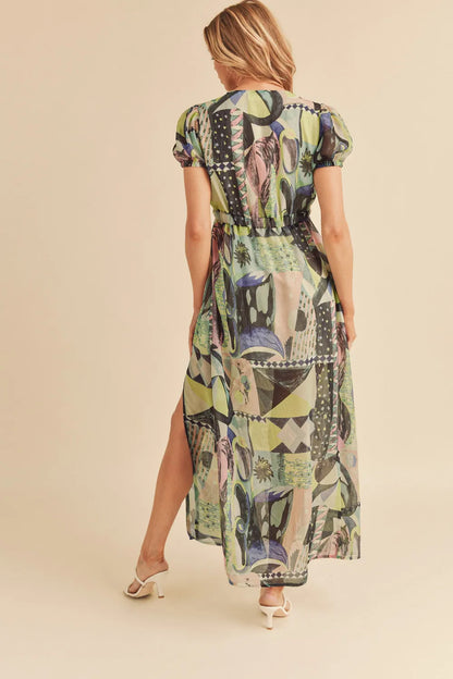 Green Aemi + Co lace detail slit geometric print short sleeve maxi dress with a flowing silhouette and stylish design.