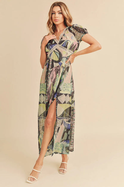 Aivemy + Co lace detail slit geometric print short sleeve maxi dress in green, featuring a stylish design and elegant silhouette.