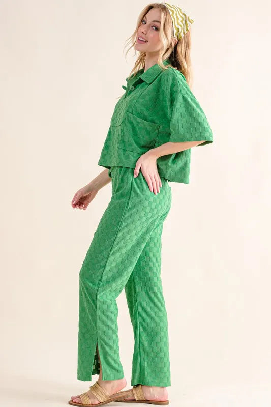 Green And The Why brushed texture casual pants with checkerboard pattern from Trendsi, showing relaxed fit and stylish design.