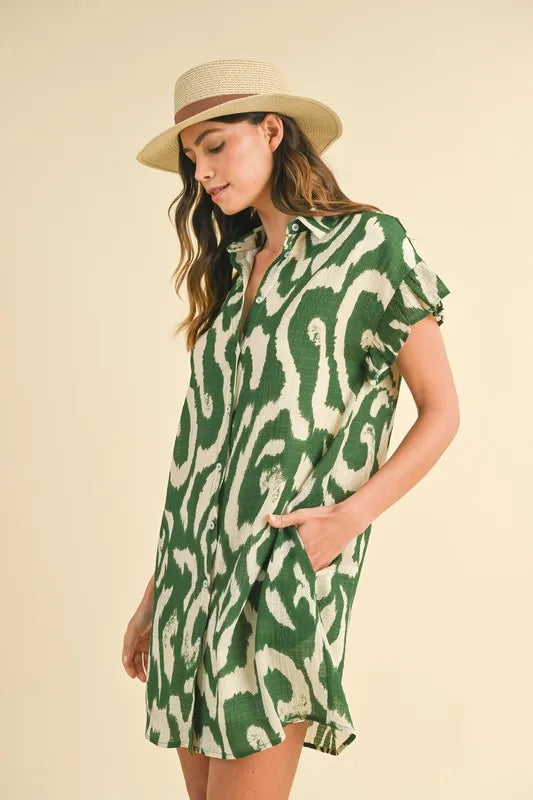 Green Annie Wear abstract printed mini dress with frill sleeves, stylish shirt dress by Trendsi, perfect for casual or dressy occasions.