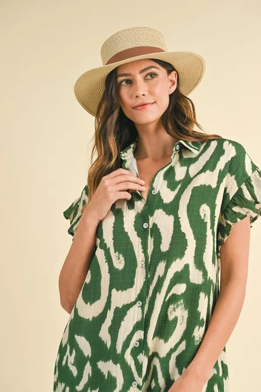 Green Annie Wear abstract printed frill sleeve shirt mini dress by Trendsi, featuring a stylish print and elegant frill details.