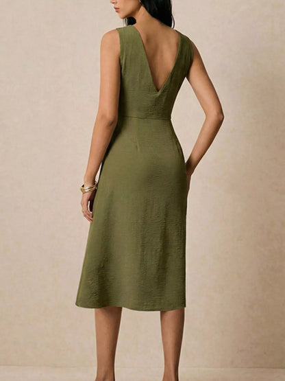 Green asymmetric neck ruched midi dress by Trendsi, showcasing a stylish, fitted design with elegant ruching details.