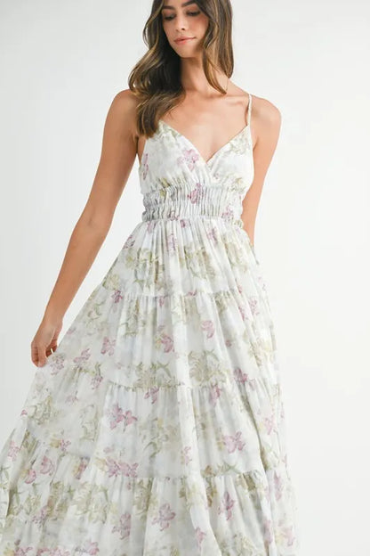 Green floral print tiered cami maxi dress by Trendsi, featuring a flowy silhouette and adjustable spaghetti straps.