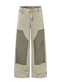 Men's green patchwork wide-leg cargo pants by Trendsi featuring multiple pockets and relaxed fit, casual streetwear style.