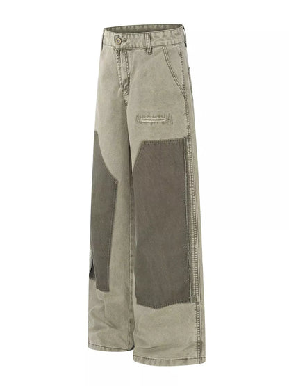 Men's green patchwork wide-leg cargo pants from Trendsi, featuring multiple pockets and a relaxed fit, designed for casual wear.