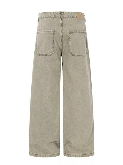 Green men's patchwork wide-leg cargo pants from Trendsi, featuring multiple fabric patches and relaxed fit.