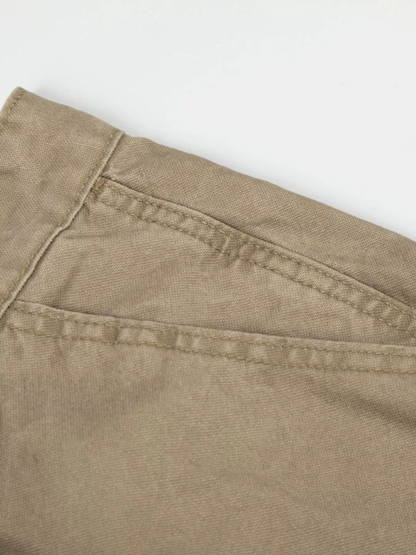 Men's green patchwork wide-leg cargo pants by Trendsi, featuring multiple pockets and relaxed fit for casual style.